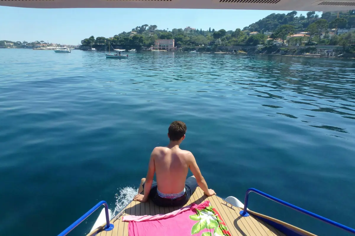 Sitting in front of the boat with your feet in the water is one of the best place to soak up the tour