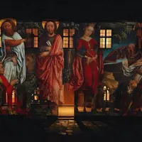 Projection d'une œuvre d'art de style Renaissance représentant des scènes bibliques sur la façade d'un bâtiment, la nuit. &copy; Musée Unterlinden