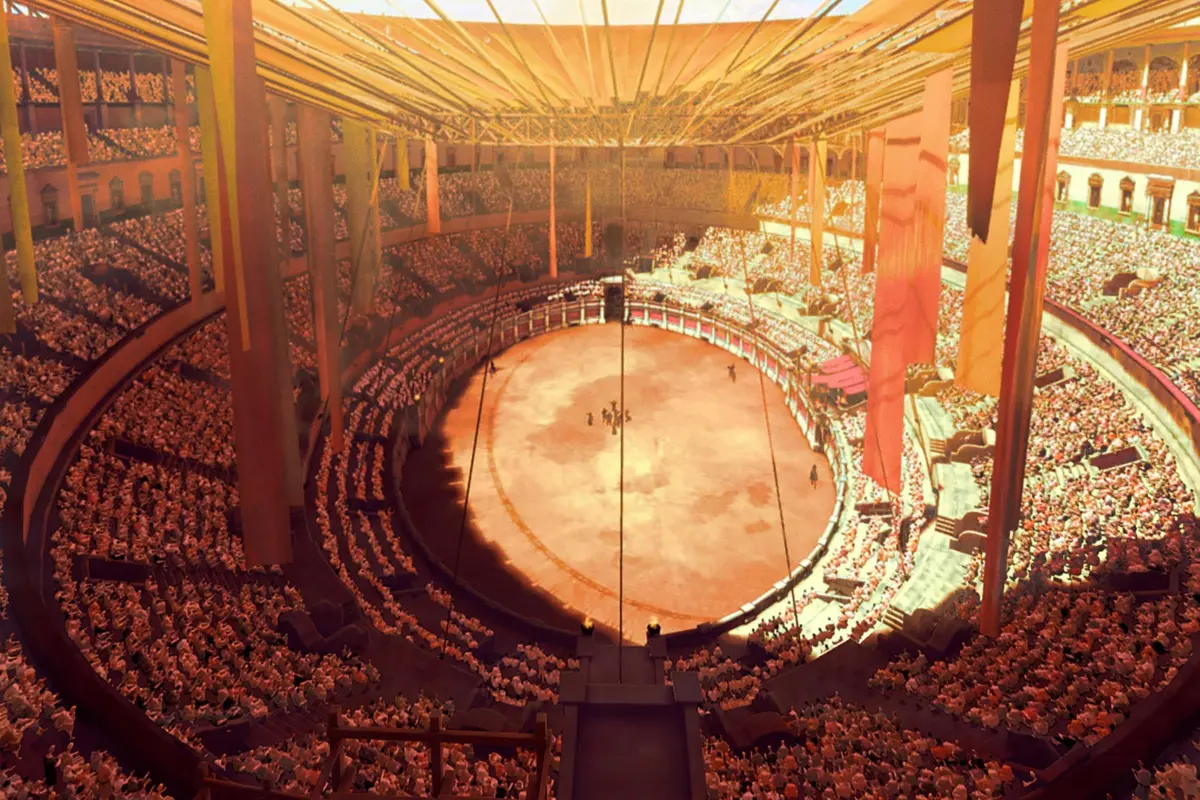 Un grand amphithéâtre circulaire rempli de spectateurs, au centre duquel se déroule un spectacle sous un éclairage chaleureux.