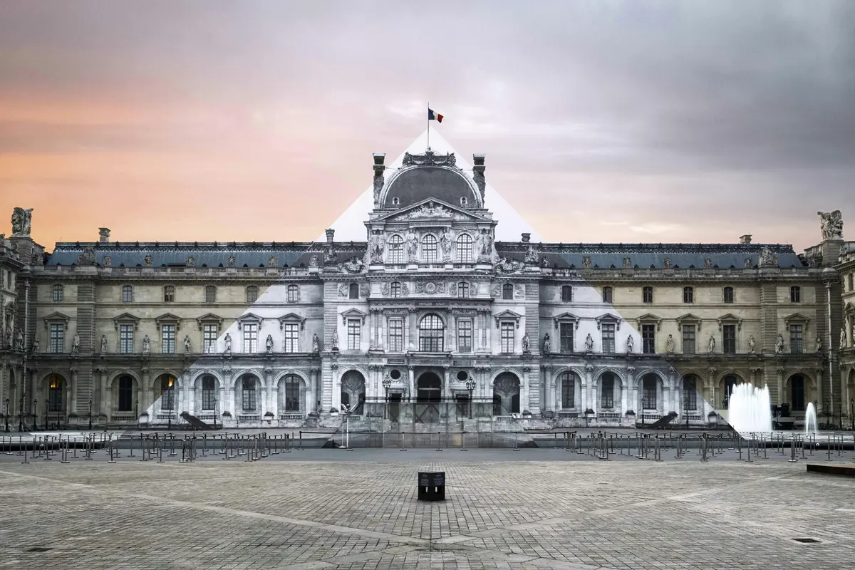 A historical building with a French flag on top and an artistic overlay of a black-and-white image over its central section.