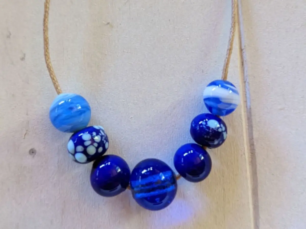 Atelier création de bijou en verre filé à Daux (31)