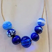 Atelier création de bijou en verre filé à Daux (31)