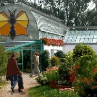 Entrée de la serrre du Jardin des Papillons d'Hunawihr en Alsace DR