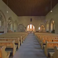 L'intérieur de l'Eglise Saint Jean de Wissembourg, depuis la nef vers le chœur et l'autel DR
