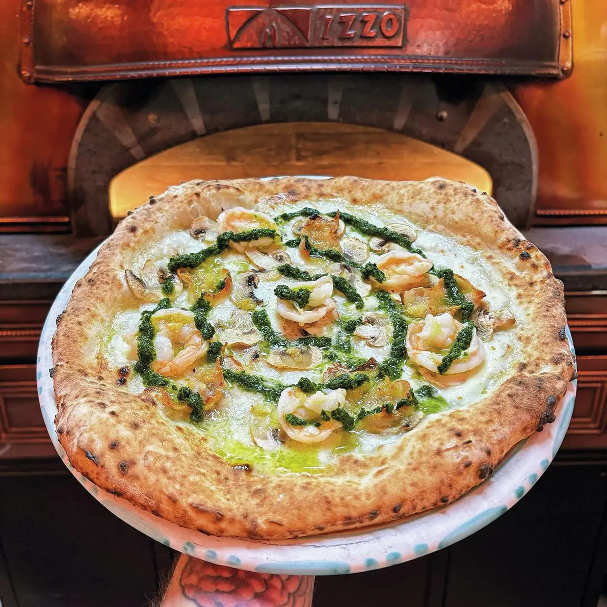 Une délicieuse pizza de chez Panettone Mulhouse