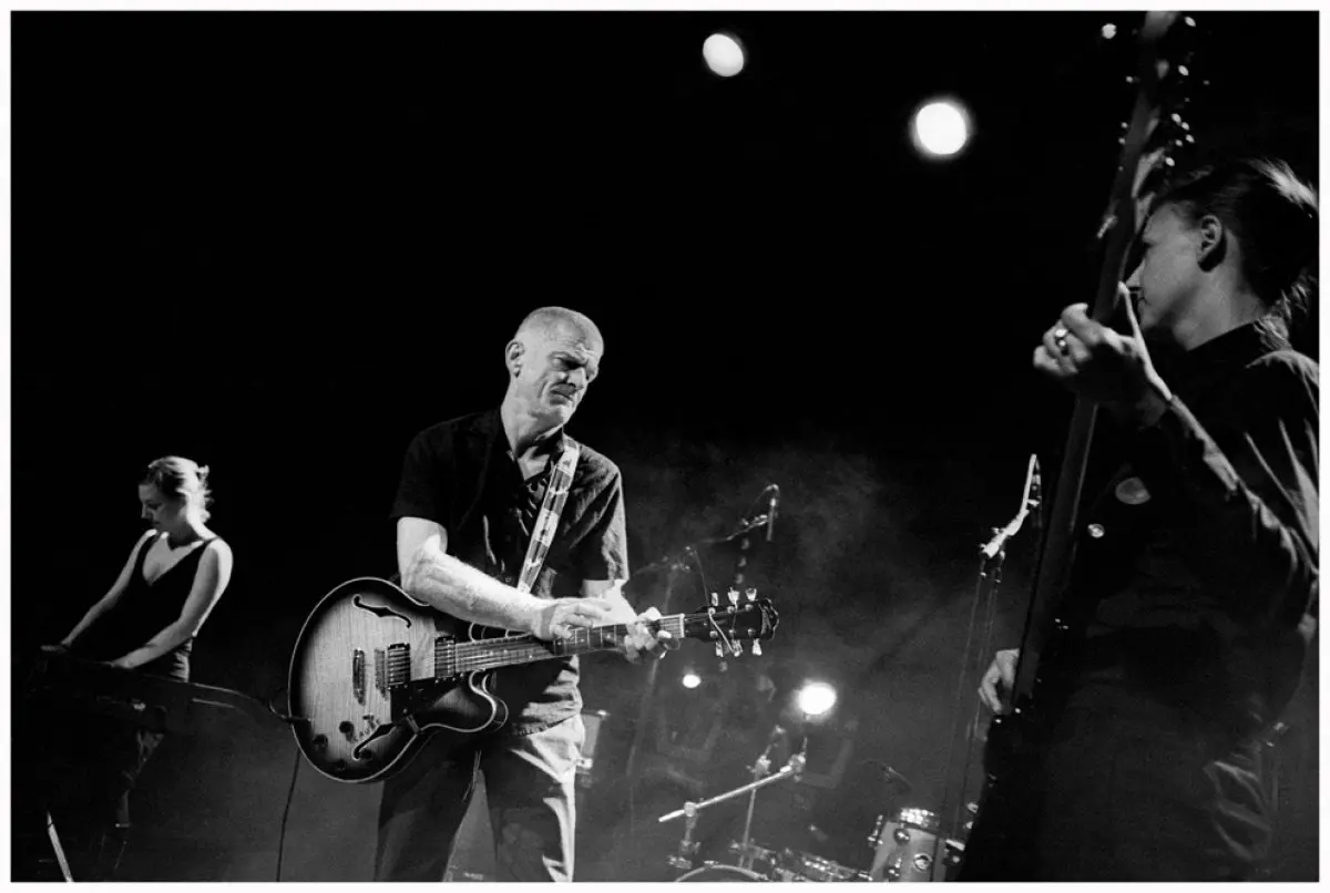 Sined, au centre, lors d'un concert avec Mig 21