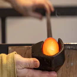 Visite d'atelier > Travail de soufflage de verre